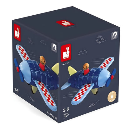 Avión Magnético de madera de Janod azul con alas a cuadros rojos y blancos, hélice azul y piloto sonriente