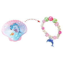 Conchas mágicas Nella Nixe com pulseira surpresa colorida revelada na água