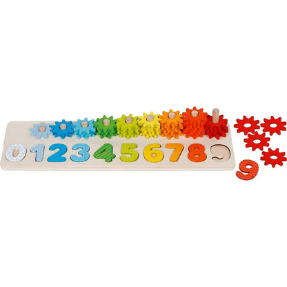 Set Educativo Aprende a Contar Goki con números de colores y ruedas dentadas en secuencia arcoíris