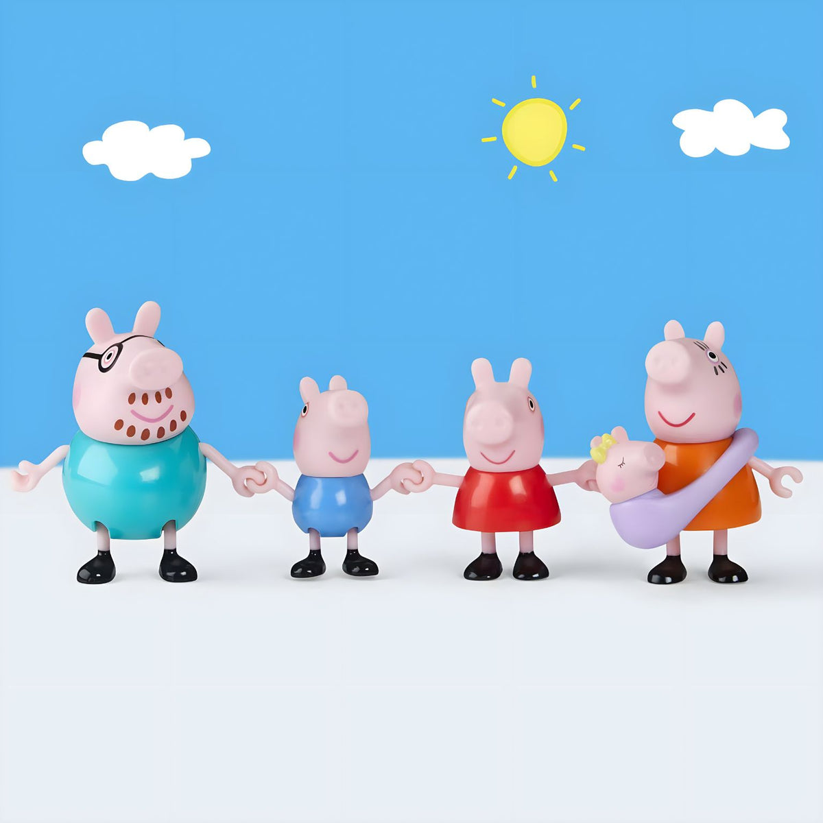 Presentación del conjunto Familia de Peppa Pig con Bebé Evie sobre fondo azul