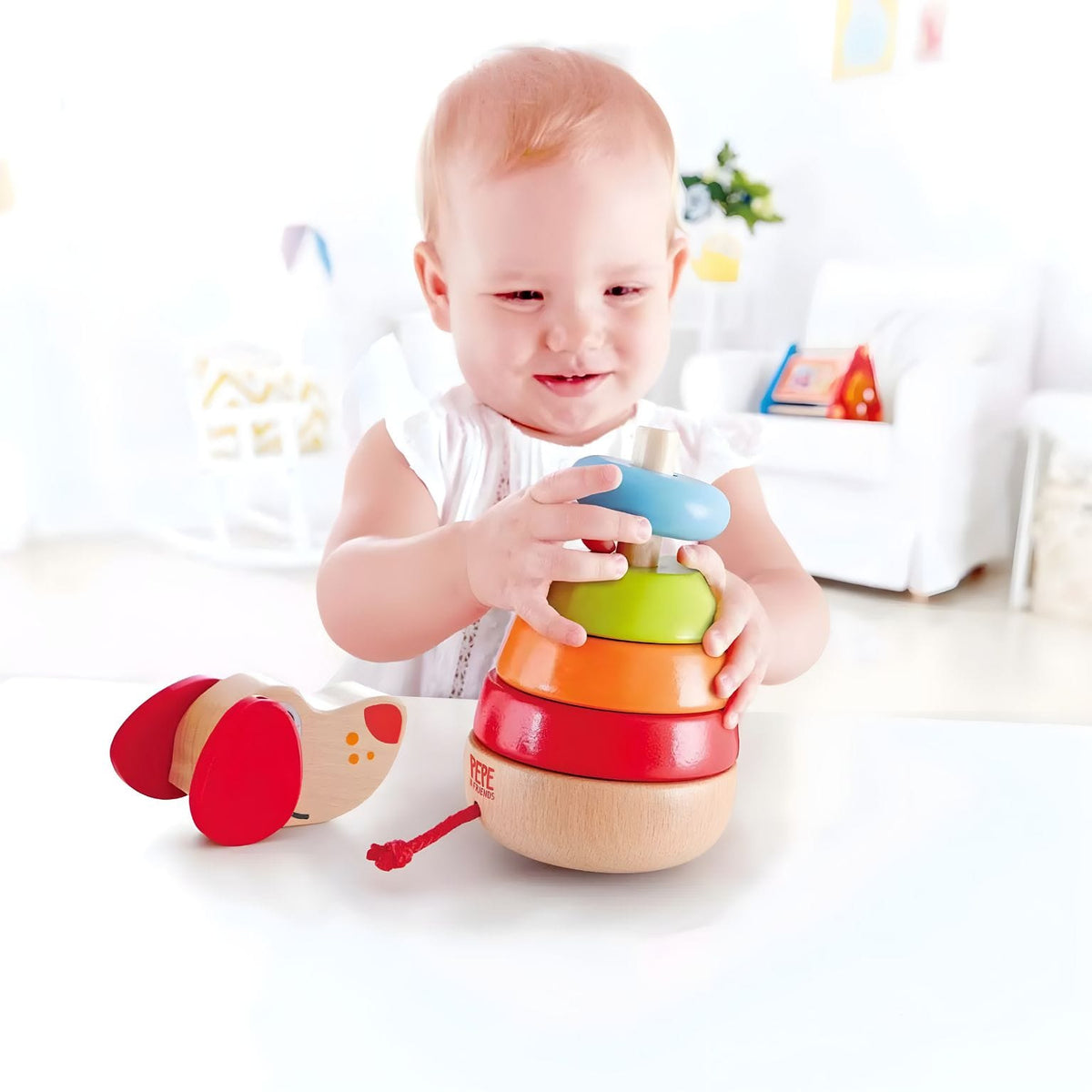 Pepe Sound Stacker Hape con piezas de colores para apilar