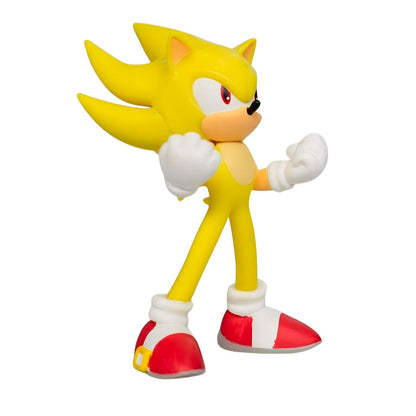 Figura Super Sonic Amarillo de Comansi con guantes blancos y zapatos rojos, personaje Sonic dorado en pose de acción