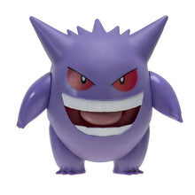 Figura Gengar roxa com sorriso largo, vista de frente