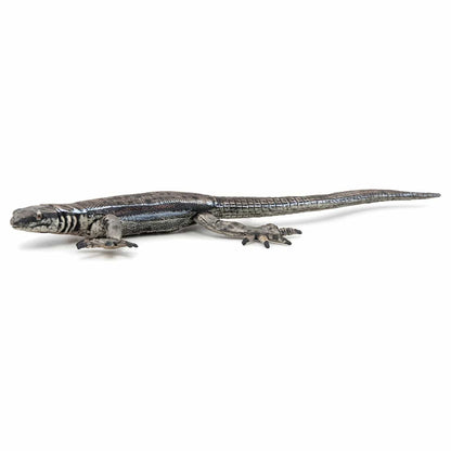 Figura de juguete lagarto común en vista de perfil