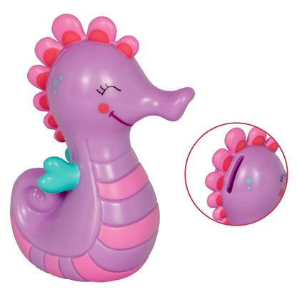 Hucha Caballito de Mar Lila de Spiegelburg en tonos lila, rosa y turquesa, con expresión sonriente y ranura para monedas