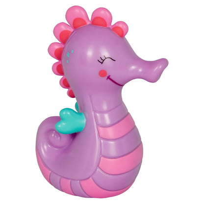 Hucha Caballito de Mar Lila de Spiegelburg en tonos lila, rosa y turquesa, con expresión sonriente y ranura para monedas
