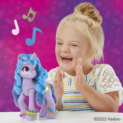 Detalles de la figura Izzy Moonbow Descubriendo el Brillo con pelo azul y accesorios