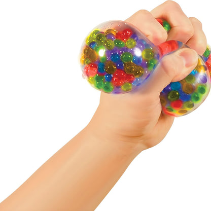 Nee Doh Squezzy Peezy de Schylling, bola sensorial transparente con cuentas coloridas para apretar