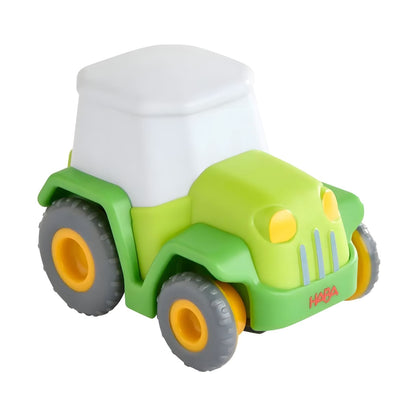 Tractor de Fricción Verde en fotografía de producto